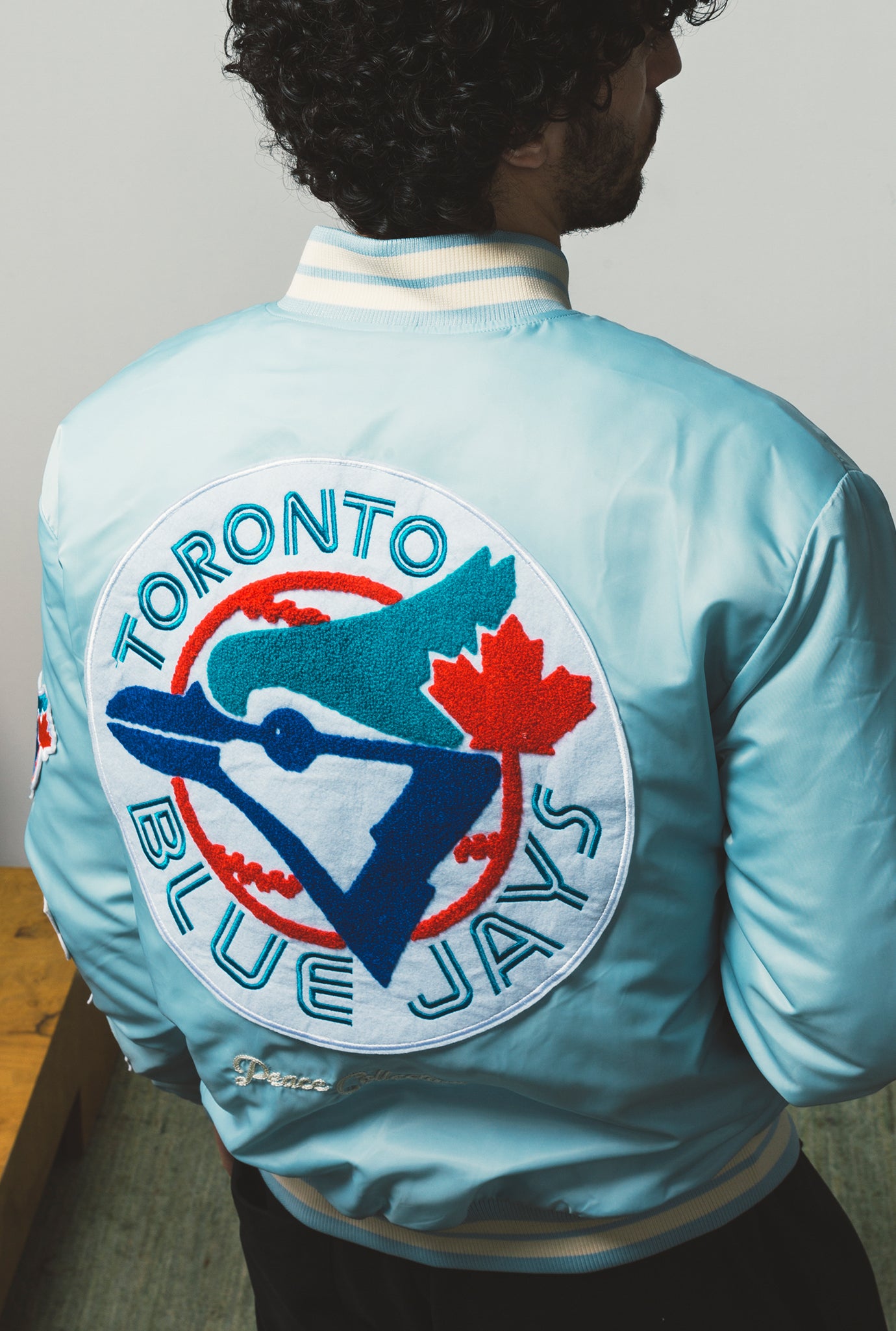 Toronto Blue Jays Ribbed Nylon Varsity Jacket - Baby Blue